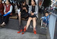 High heels red, black nylon feet and shoe play